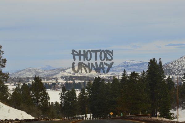 Highway Shot With Snow Mountain